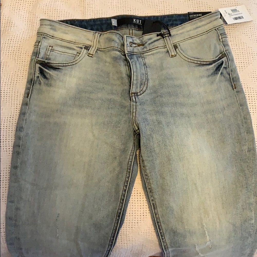 Light wash boyfriend jean with pearl cuff detail